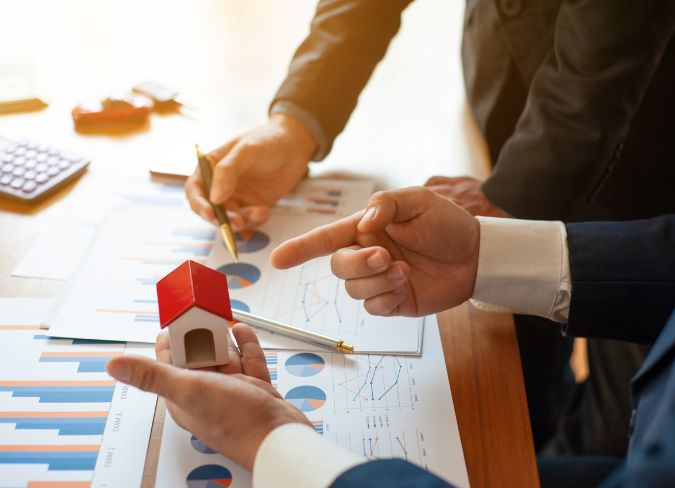 2 Emplyees discussing on property managment in Edmonton